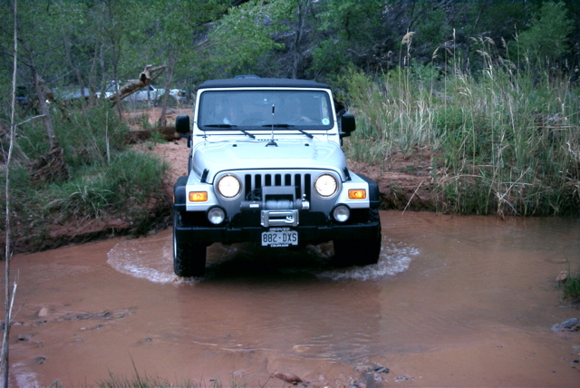 Jeep in Arch Canyon
